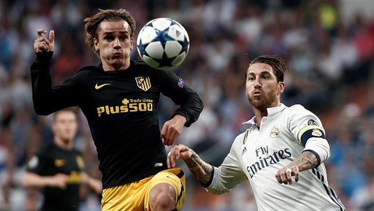 Antoine Griezmann dan Sergio Ramos. Copyright: Burak Akbulut/Anadolu Agency/Getty Images