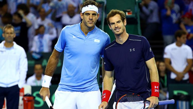 Juan Martin del Potro dan Andy Murray saat bertemu di ajang Piala Davis 2016. - INDOSPORT