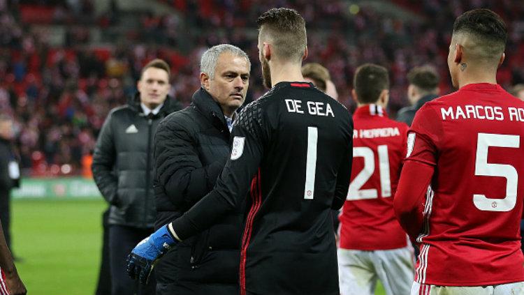 Jose Mourinho dan David De Gea. Copyright: John Patrick Fletcher/Action Plus via Getty Images