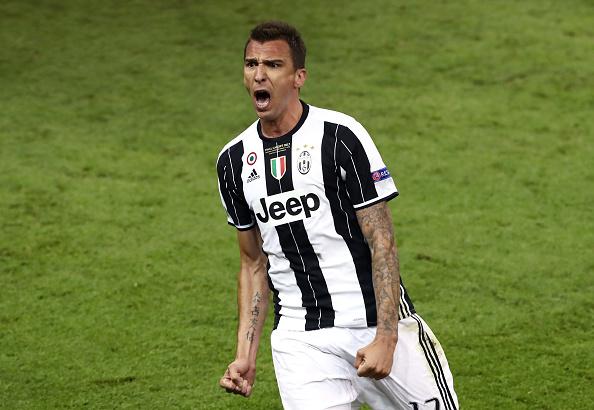 Striker Juventus, Mario Mandzukic mencetak gol tunggal ke gawang Real Madrid. Copyright: INDOSPORT
