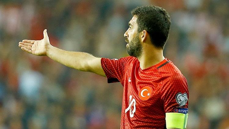 Arda Turan pensiun dari Timnas usai berseteru dengan wartawan. - INDOSPORT