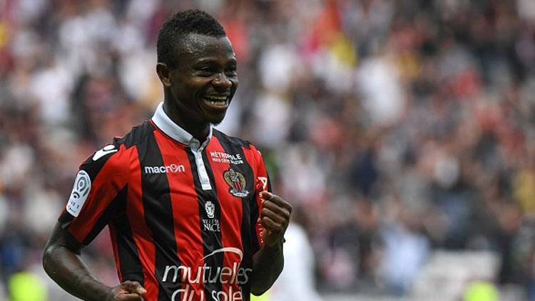 Selebrasi Jean Michael Seri. Copyright: INDOSPORT