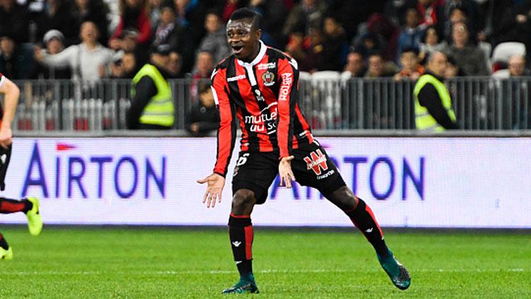 Selebrasi Jean Michael Seri. Copyright: INDOSPORT