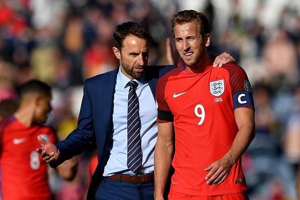 Pelatih dan striker Timnas Inggris, Gareth Southgate (kiri) dan Harry Kane. Copyright: INDOSPORT