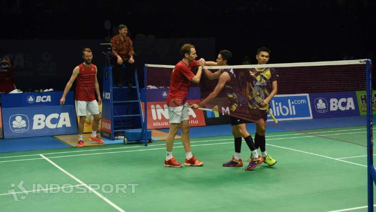 Mathias Boe/Carsten Mogensen usai pertandingan lawan Fajar/Rian. Copyright: Herry Ibrahim/INDOSPORT