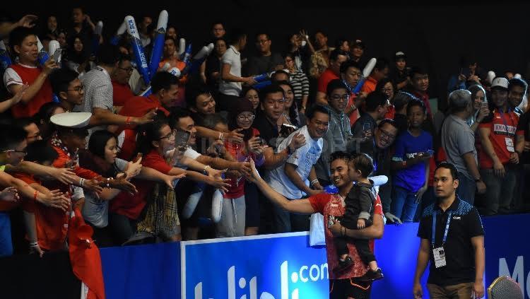 Tontowi Ahmad/Liliyana Natsir setelah berhasil menjadi juara Indonesia Open 2017.