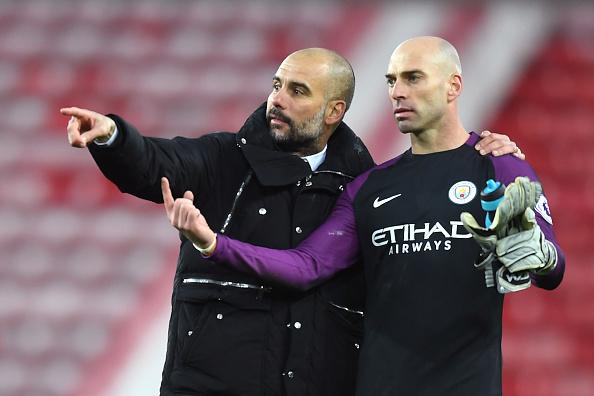 Willy Caballero dan Pep Guardiola. Copyright: INDOSPORT