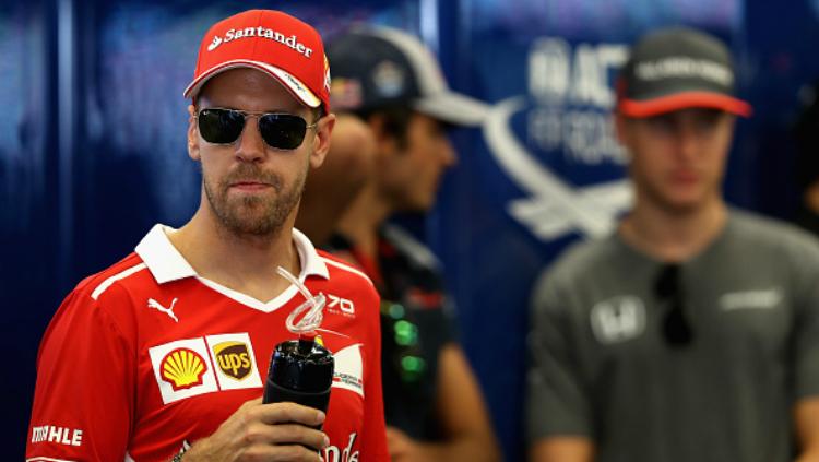Pembalap Ferrari, Sebastian Vettel. - INDOSPORT
