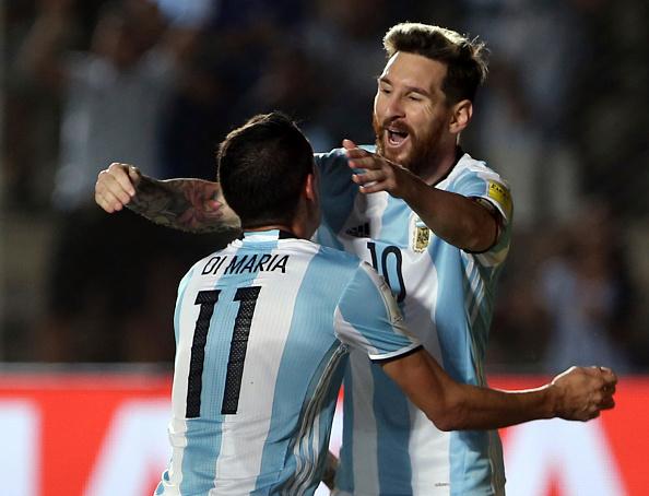 Angel Di Maria dan Lionel Messi tengah berselebrasi. Copyright: Daniel Jayo/LatinContent/Getty Images