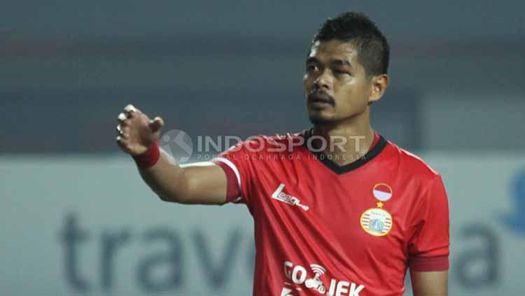 Mata kiri Bambang Pamungkas lebam akibat benturan saat laga melawan Persipura. Copyright: Indosport/Herry Ibrahim