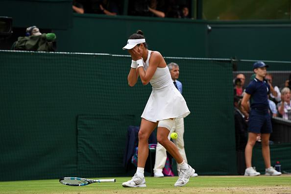 Garbine Muguruza tak kuasa menahan tangis saat memastikan diri menjadi juara Wimbledon 2017. Copyright: INDOSPORT