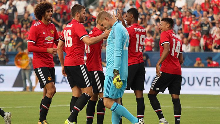 Selebrasi pemain Manchester United setelah Marcus Rashford cetak gol. Copyright: INDOSPORT