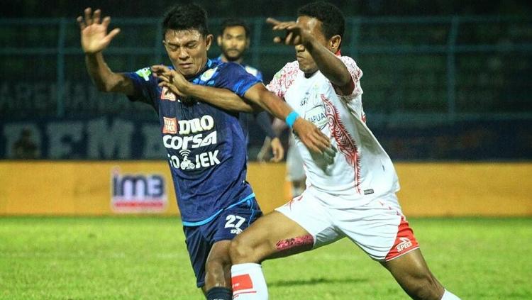 Persipura bungkam perlawanan Arema FC. Copyright: wearemania.net