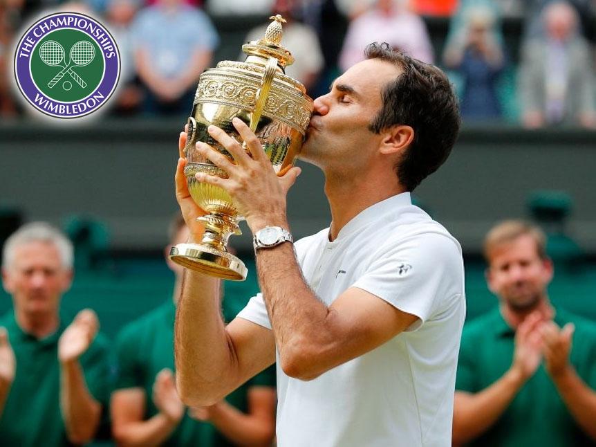 Petenis Swiss Roger Federer meraih trofi Grand Slam ke-19 setelah mengalahkan petenis Kroasia Marin Cilic, di final Wimbledon. Copyright: Indosport.com
