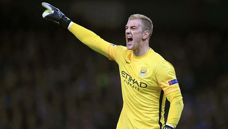 Aksi selebrasi Joe Hart saat bersama Manchester City.