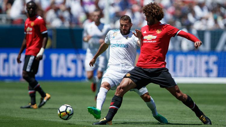 Real Madrid kontra Manchester United berakhir imbang dengan skor 1-1. Copyright: Robbie Jay Barratt - AMA/Getty Images