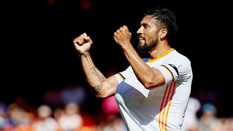 Bek valencia, Ezequiel Garay. Copyright: INDOSPORT