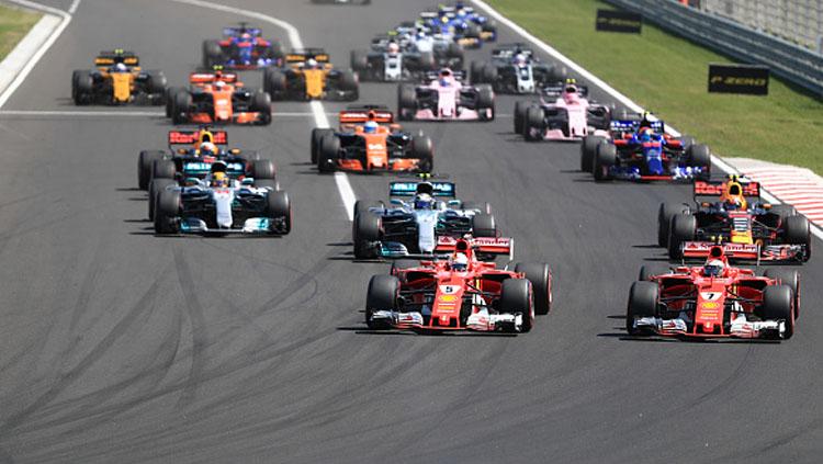 Sebastian Vettel memimpin balapan pada Formula 1 di Hungaria. Copyright: INDOSPORT