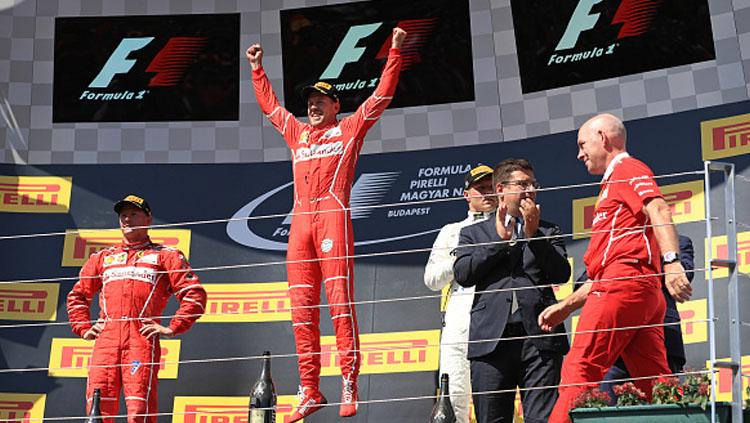 Pembalap Ferrari, Sebastian Vettel, memenangi balapan Formula 1 GP Hungaria di Sirkuit Hungaroring.