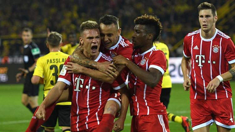 Selebrasi para pemain Bayern Munchen usai mencetak gol ke gawang Dortmund. - INDOSPORT