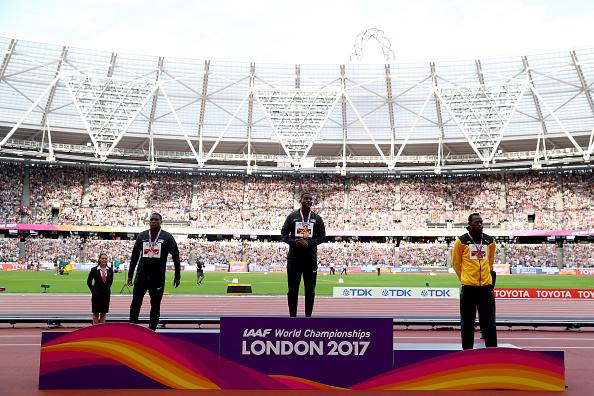 Justin Gatlin (tengah), Christian Coleman (kiri), dan Usain Bolt (kanan). Copyright: INDOSPORT