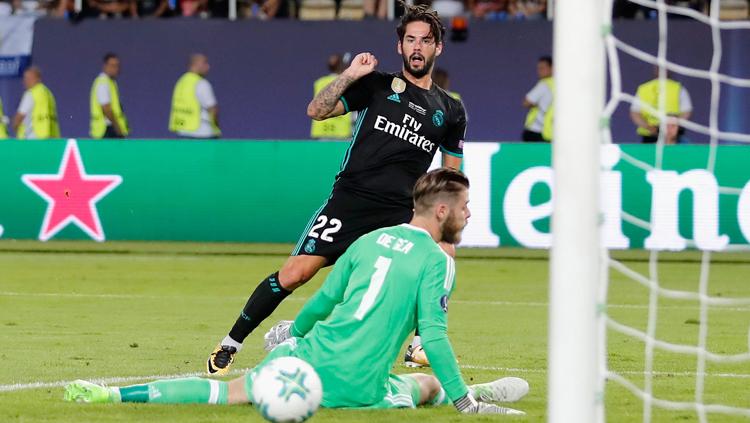 Momen Isco berhasil mencetak gol ke gawang David De Gea. Copyright: INDOSPORT