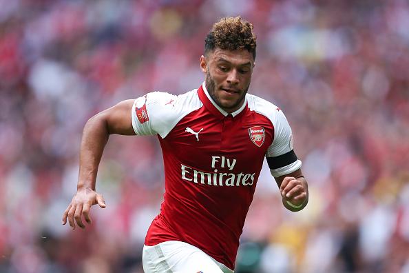 Alex-Oxlade Chamberlain, gelandang tengah Arsenal menjadi incaran Chelsea. Copyright: INDOSPORT