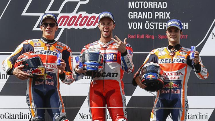 Marc Marquez, Andrea Dovizioso, dan Dani Pedrosa di podium GP Austria 2017. Copyright: INDOSPORT