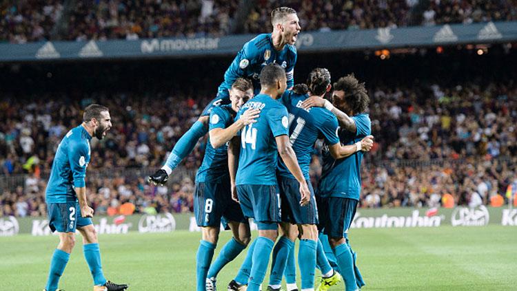 Aksi selebrasi pemain Real Madrid setelah Cristiano Ronaldo cetak gol. Copyright: INDOSPORT