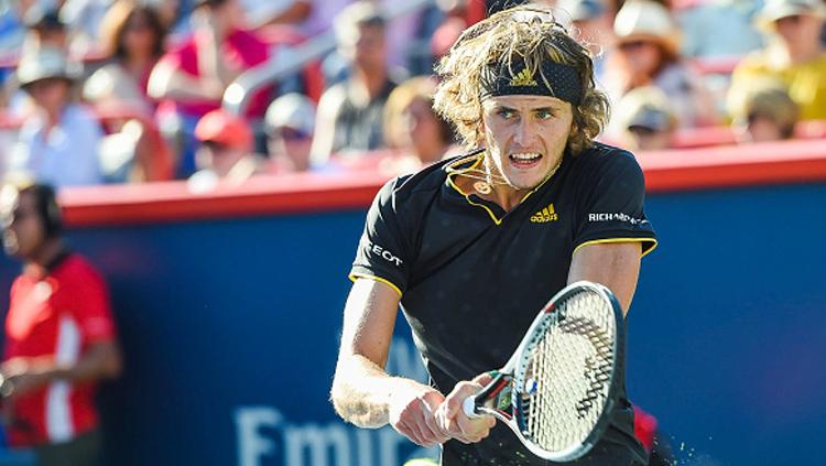 Alexander Zverev berhasil memenangkan trofi Roger Cup. - INDOSPORT