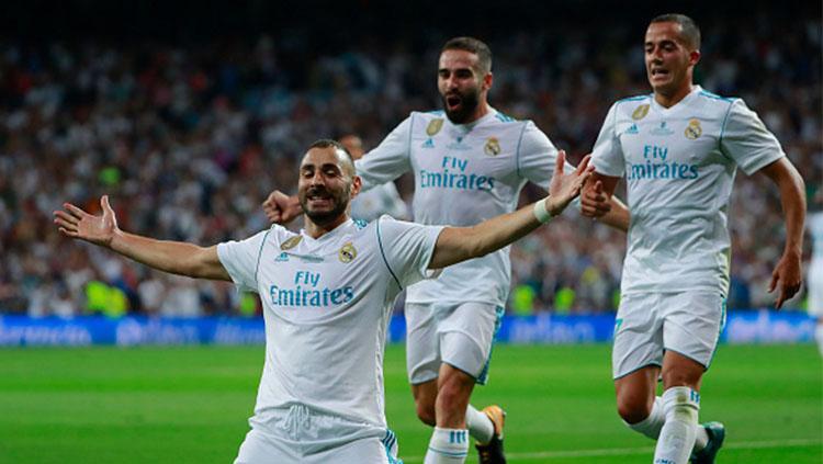 Selebrasi Karim Benzema saat mencetak gol kedua bagi Real Madrid saat melawan Barcelona.