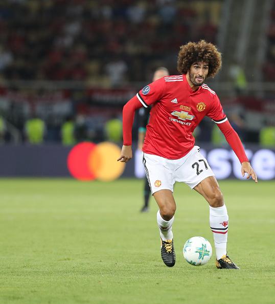 Marouane Fellaini, pemain bintang Man United. Copyright: INDOSPORT