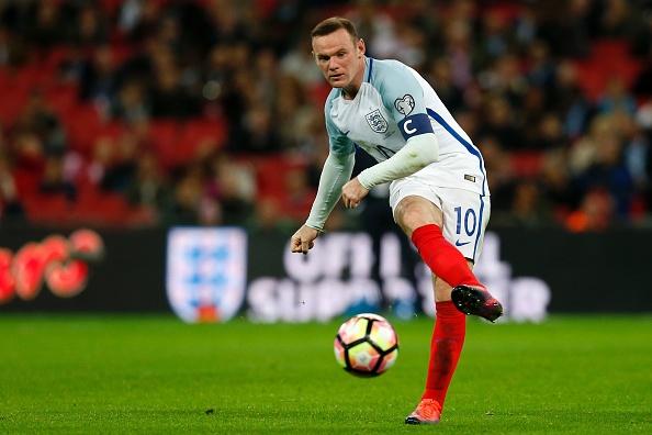 Wayne Rooney, saat membela Timnas Inggris. Copyright: INDOSPORT