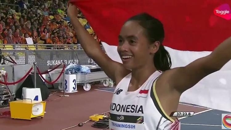 Triyaningsih berhasil sumbang medali emas di cabor Atletik nomor 10.000m. Copyright: Istimewa