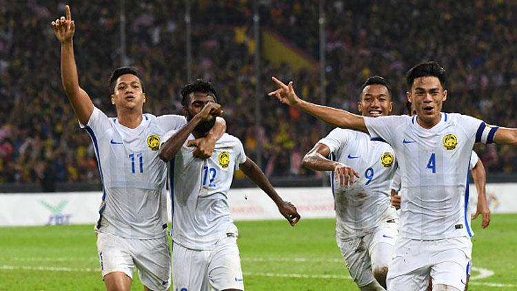 Selebrasi pemain Malaysia setelah Thanabalan Nadarajah menjebol gawang Timnas Indonesia U-22 di semifinal SEA Games 2017 (26/8/17). Copyright: Indosport,com