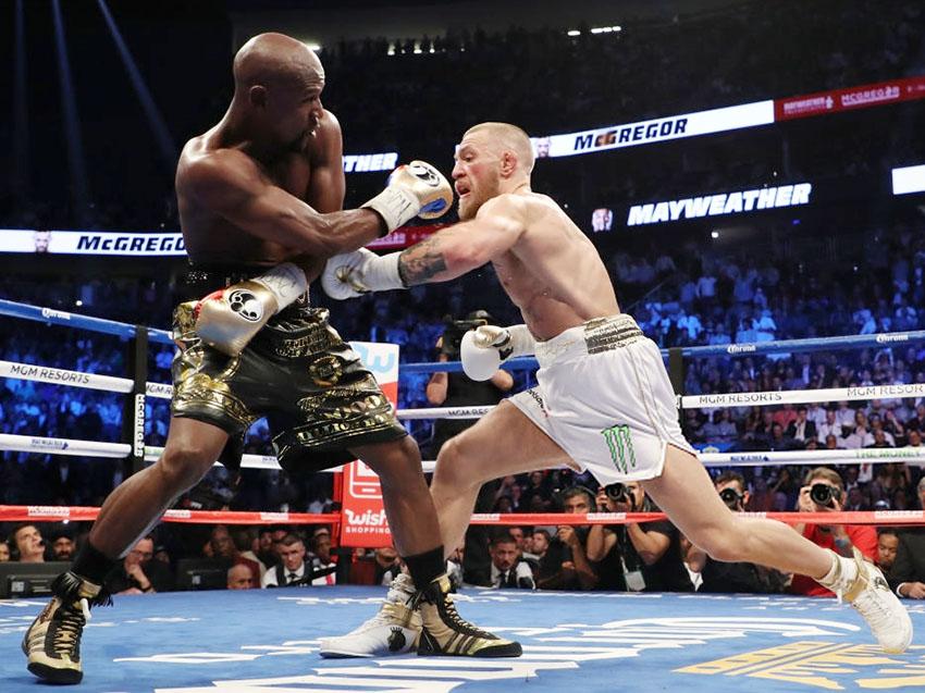 Floyd Mayweather Jr vs Conor McGregor. Copyright: Indosport.com