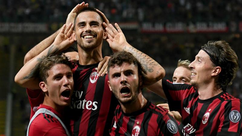 Para pemain AC Milan merayakan gol yang dicetak oleh Suso. Copyright: INDOSPORT