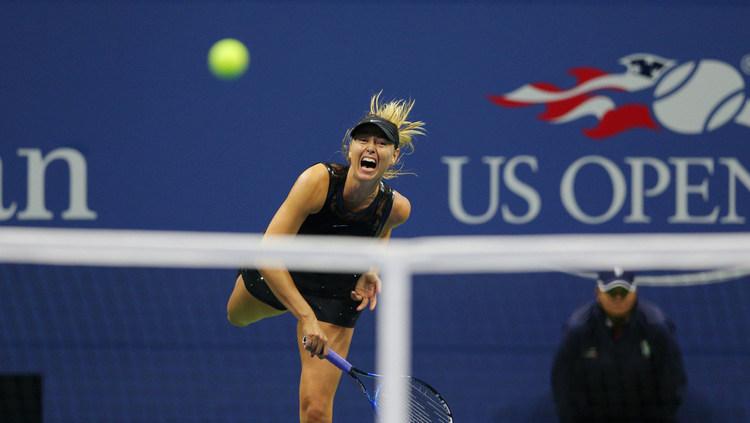 Maria Sharapova menang secara dramatis dari Simona Halep, yang juga unggulan kedua dalam turnamen AS Terbuka 2017. Copyright: USTA/Garrett Ellwood