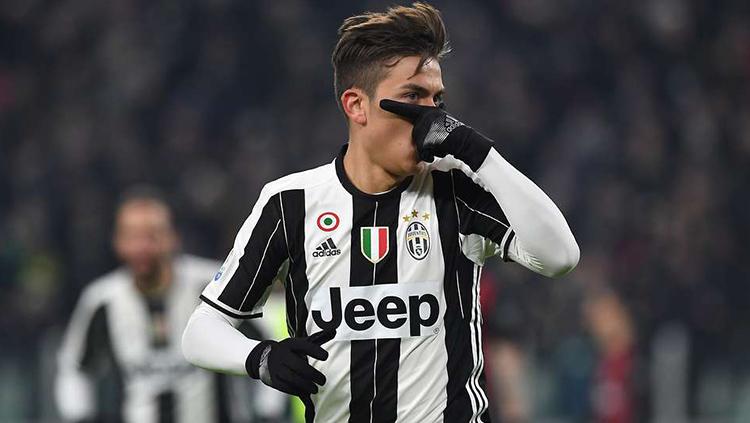 Paulo Dybala memeragakan gaya selebrasi khasnya, dybalamask Copyright: INDOSPORT