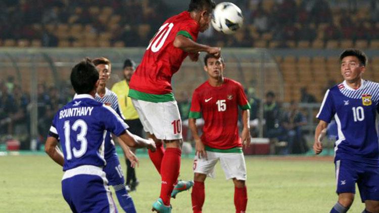 Muchlis Hadi Ning Syaifulloh saat mencetak gol ke gawang Laos di ajang Kualifikasi Piala Asia U-19 2013. Copyright: Kompas.com