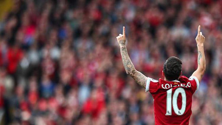 Selebrasi pemain megabintang Liverpool, Philippe Coutinho. Copyright: INDOSPORT