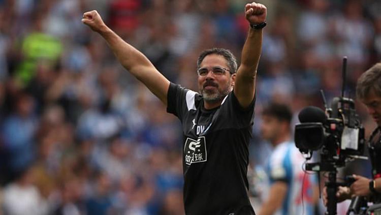 David Wagner melakukan selebrasi atas hasil apik yang diraih Huddersfield Town. Copyright: Indosport