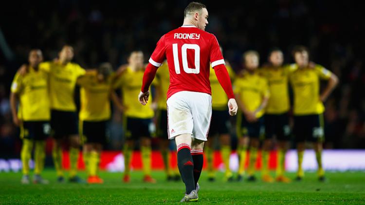 Wayne Rooney saat mengenakan kostum Manchester United. Copyright: getty images