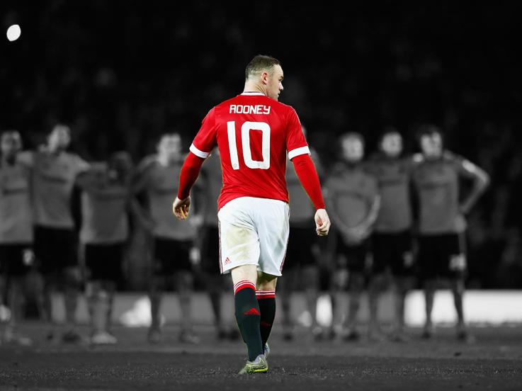 Wayne Rooney saat mengenakan kostum Manchester United. Copyright: Grafis: Eli Suhaeli/INDOSPORT