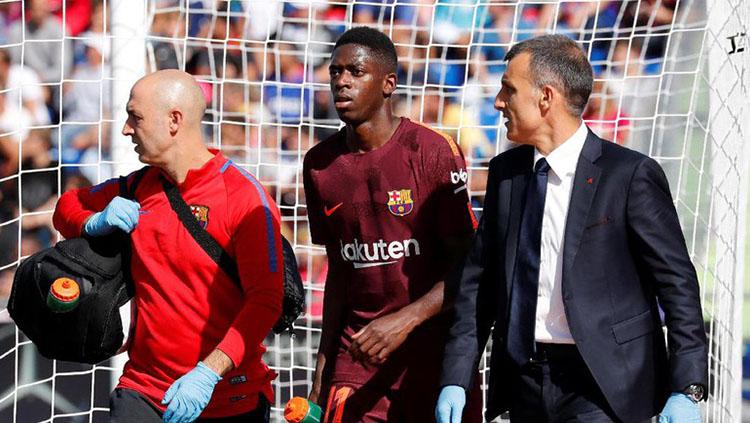 Ousmane Dembele saat alami cedera. Copyright: Reuters