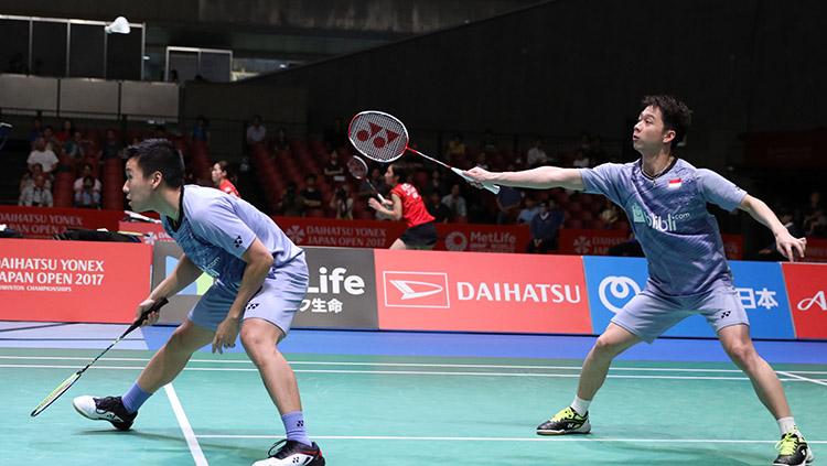 Pasangan ganda putra Indonesia, Marcus Fernaldi Gideon dan Kevin Sanjaya lolos ke semifinal. - INDOSPORT