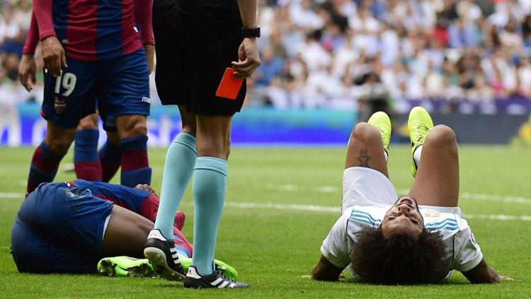 Marcelo absen memperkuat Real Madrid melawan Deportivo Alaves karena cedera. - INDOSPORT