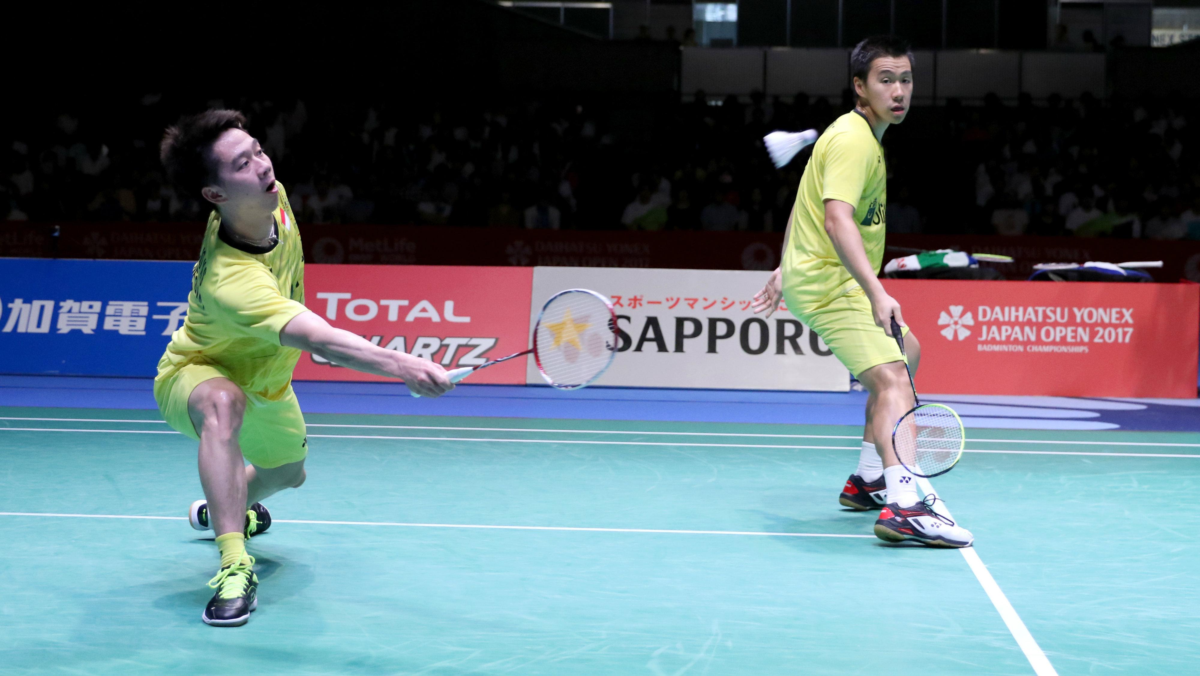 Aksi Kevin/Marcus di laga final Japan Open Super Series 2017. Copyright: Humas PBSI