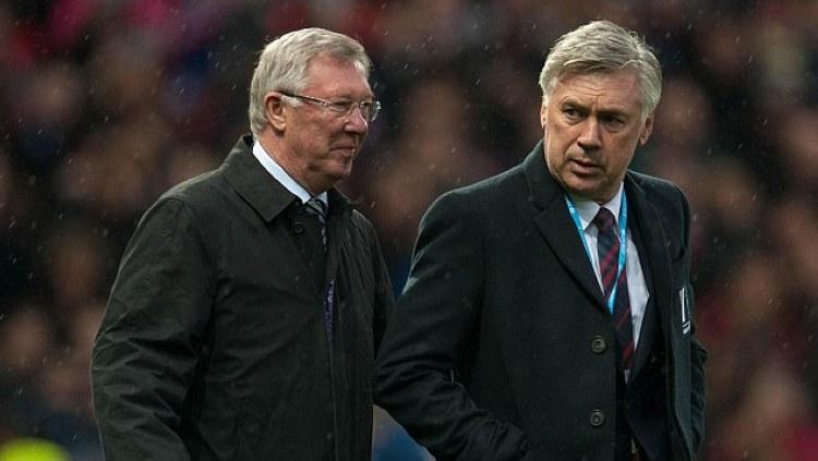 Sir Alex Ferguson dan Carlo Ancelotti. Copyright: Ian Hodgson/Gettyimages