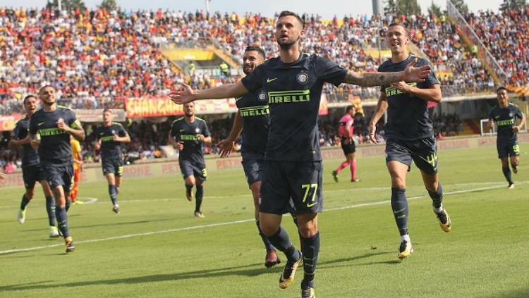 Pemain Inter Milan melakukan selebrasi. Copyright: INDOSPORT